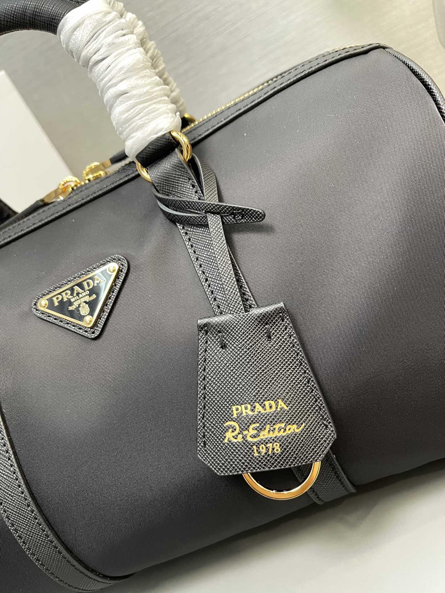 Prada 1BB233 Prada Re-Edition 1978 medium Re-Nylon and Saffiano leather top-handle bag Black