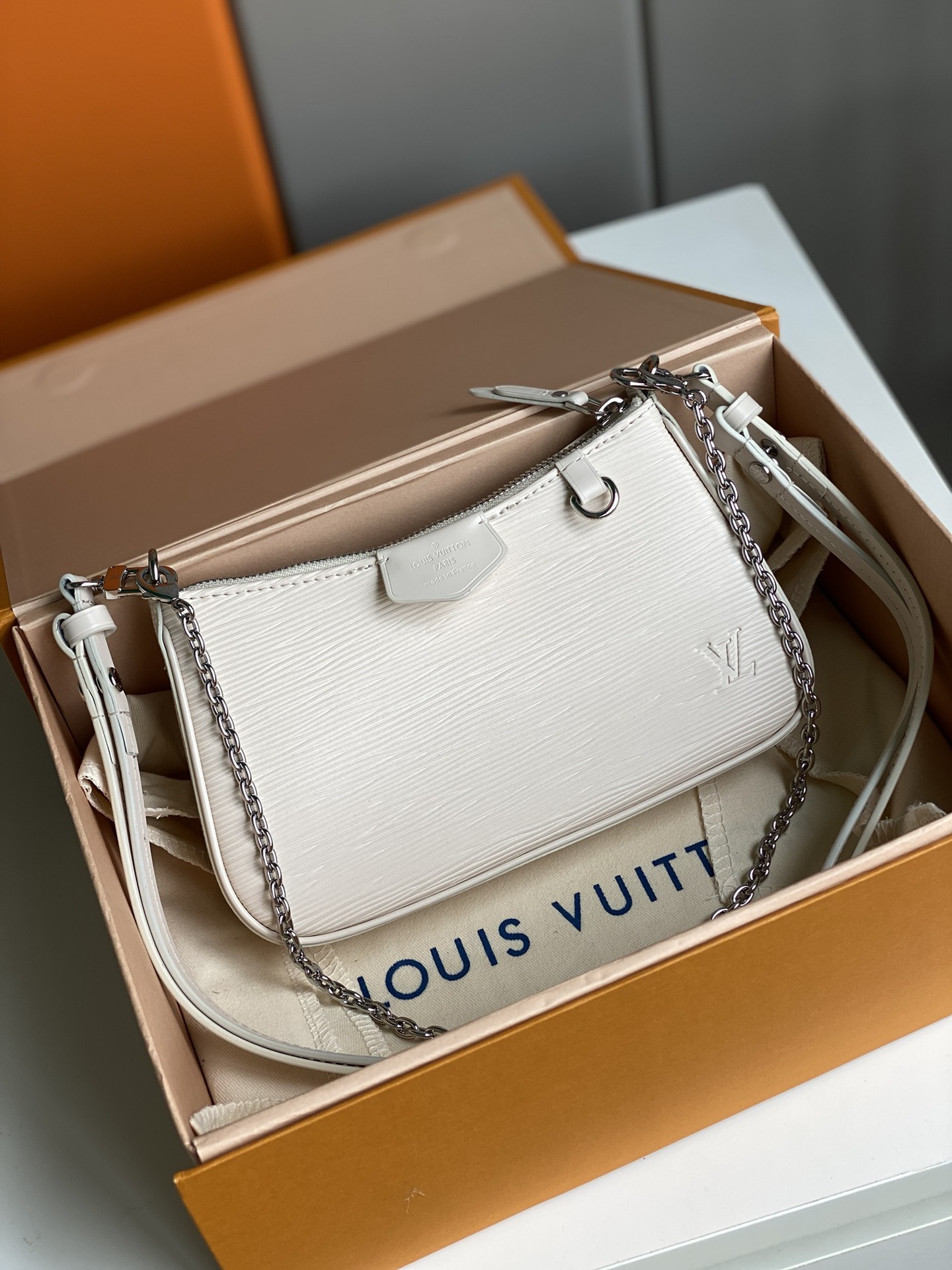 Replica Louis Vuitton Easy Pouch On Strap Epi Embossed Supple Grained Cowhide Leather White