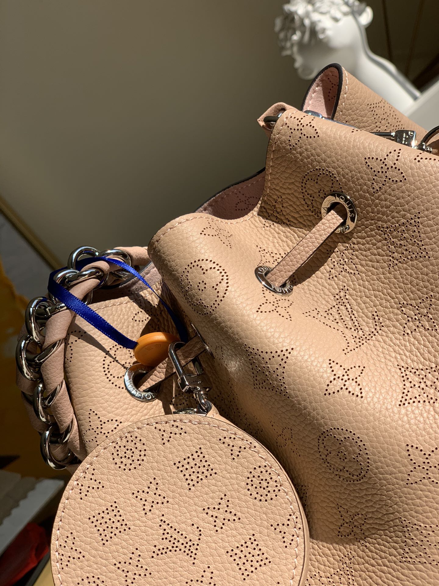 Replica Louis Vuitton M57068 Bella Bucket Bag in Mahina Calf Leather wite Perforated Monogram Pattern Magnolia Pink