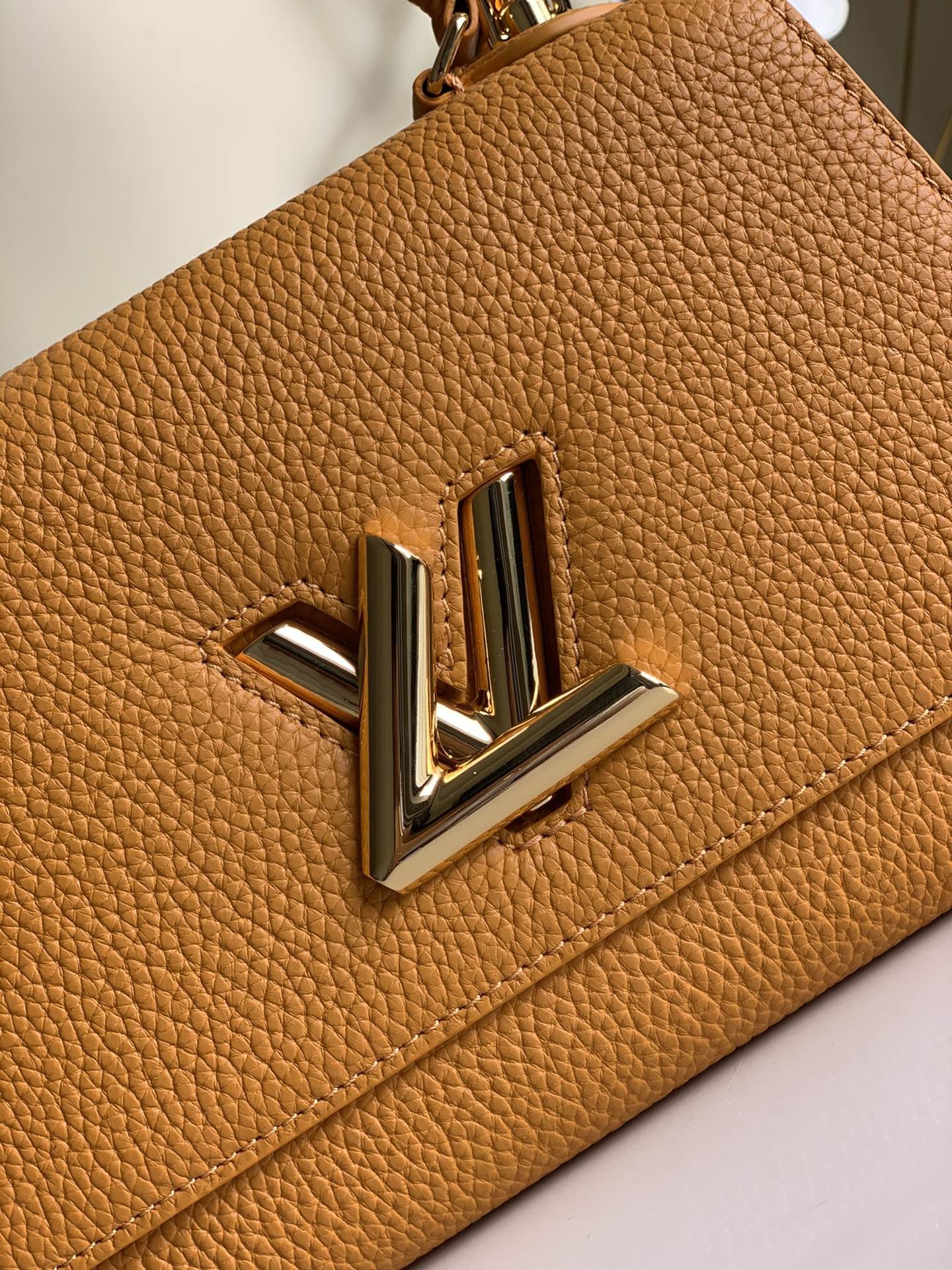 Replica Louis Vuitton M57136 Twist One Handle PM Taurillon Leather Saffron