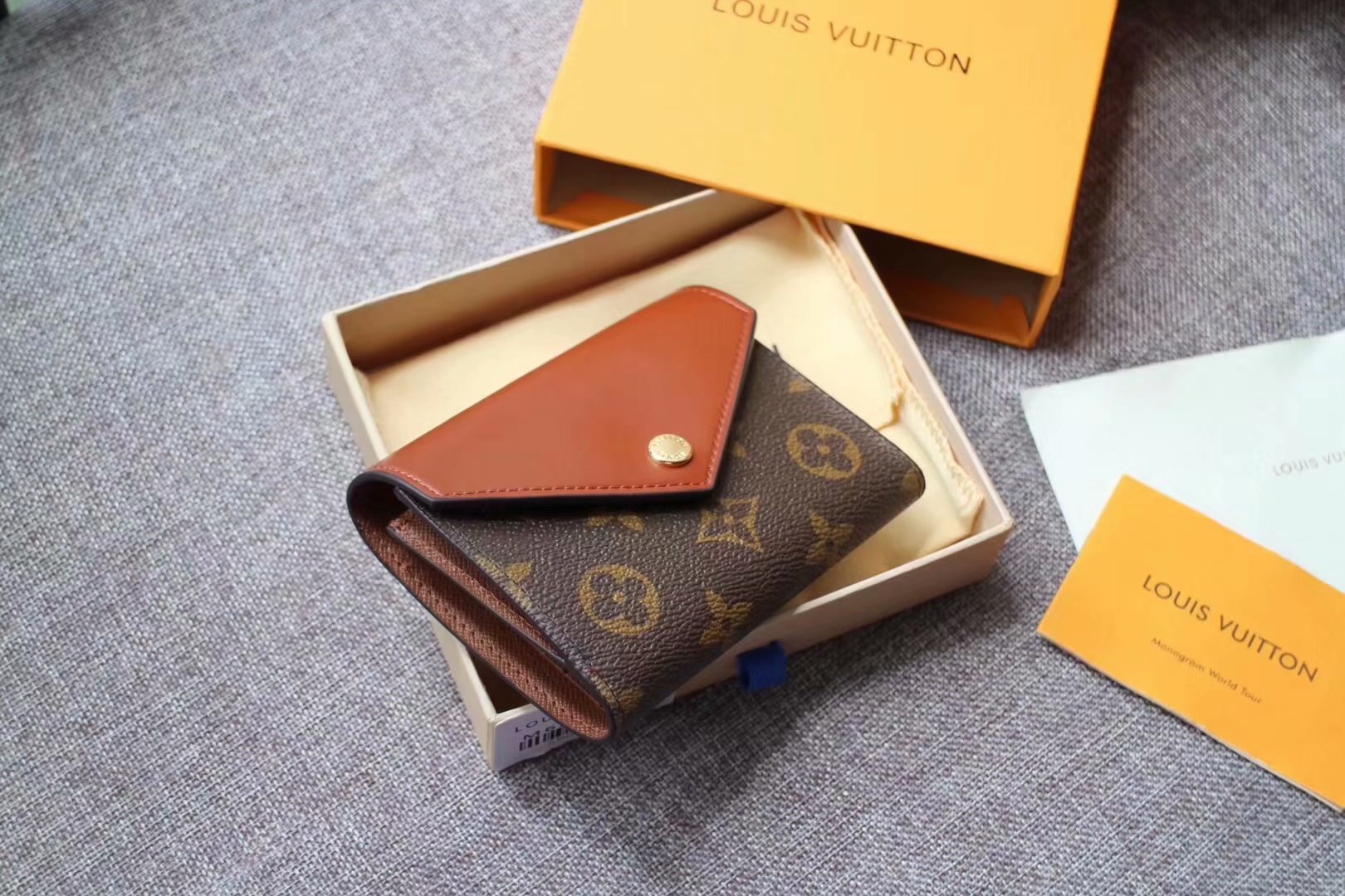 Replica Louis Vuitton M62933 Zoe Wallet Monogram Empreinte Leather Brown