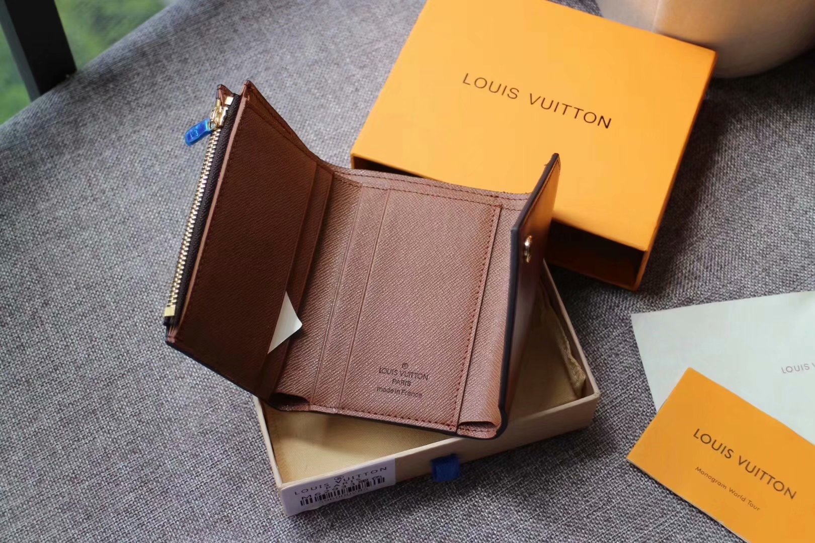 Replica Louis Vuitton M62933 Zoe Wallet Monogram Empreinte Leather Brown