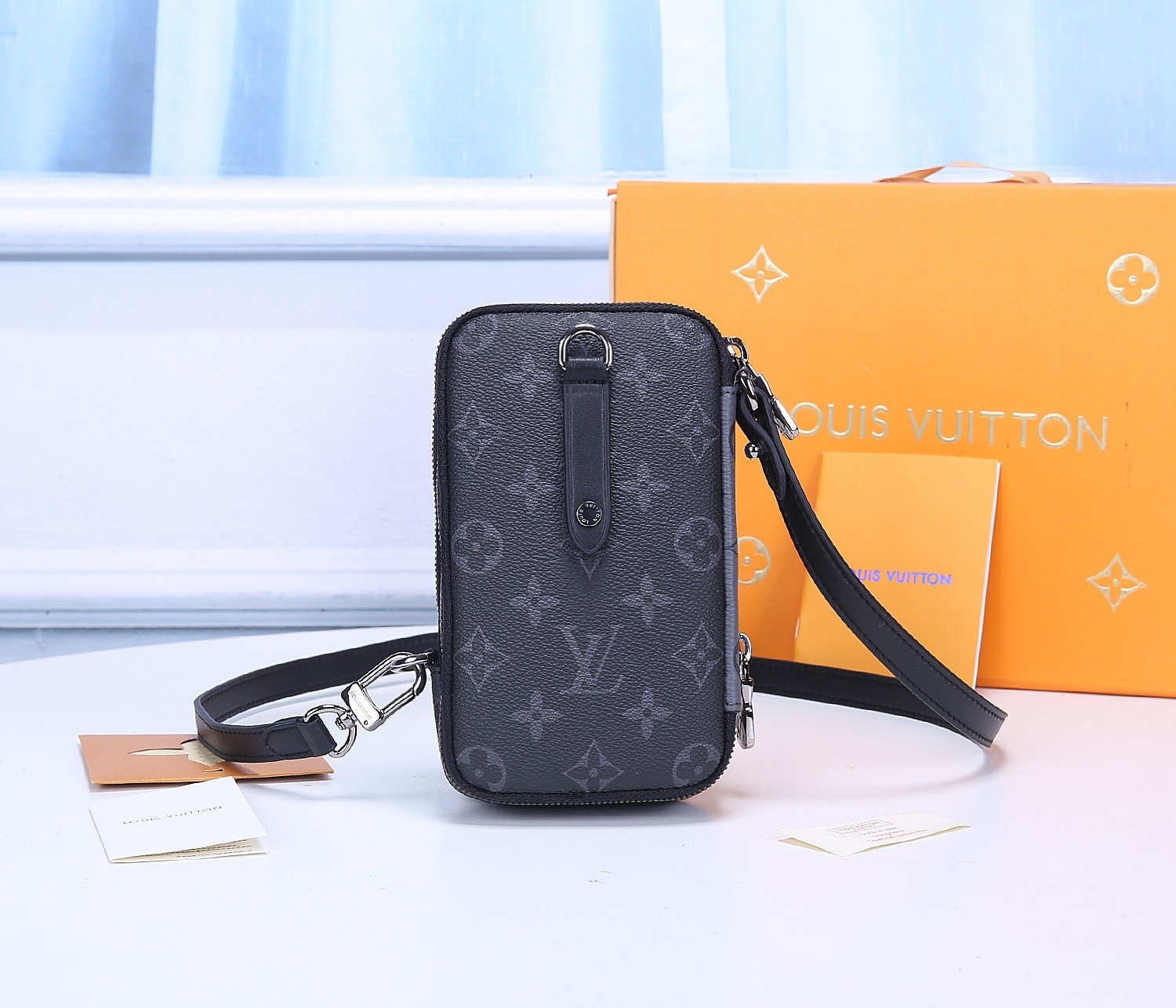 Replica Louis Vuitton M69534 Double Phone Pouch in Monogram Eclipse Canvas and Monogram Eclipse Reverse Canvas