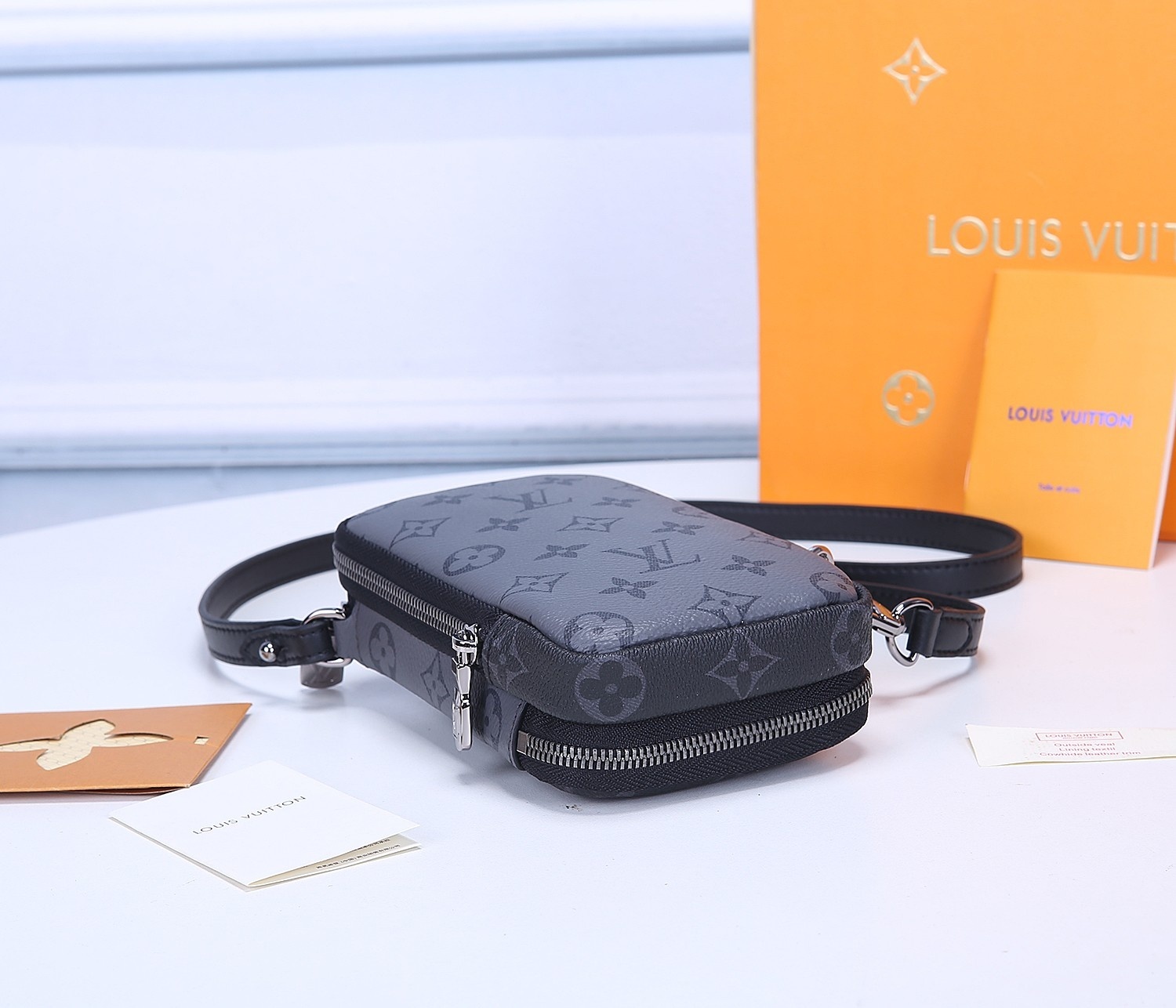 Replica Louis Vuitton M69534 Double Phone Pouch in Monogram Eclipse Canvas and Monogram Eclipse Reverse Canvas