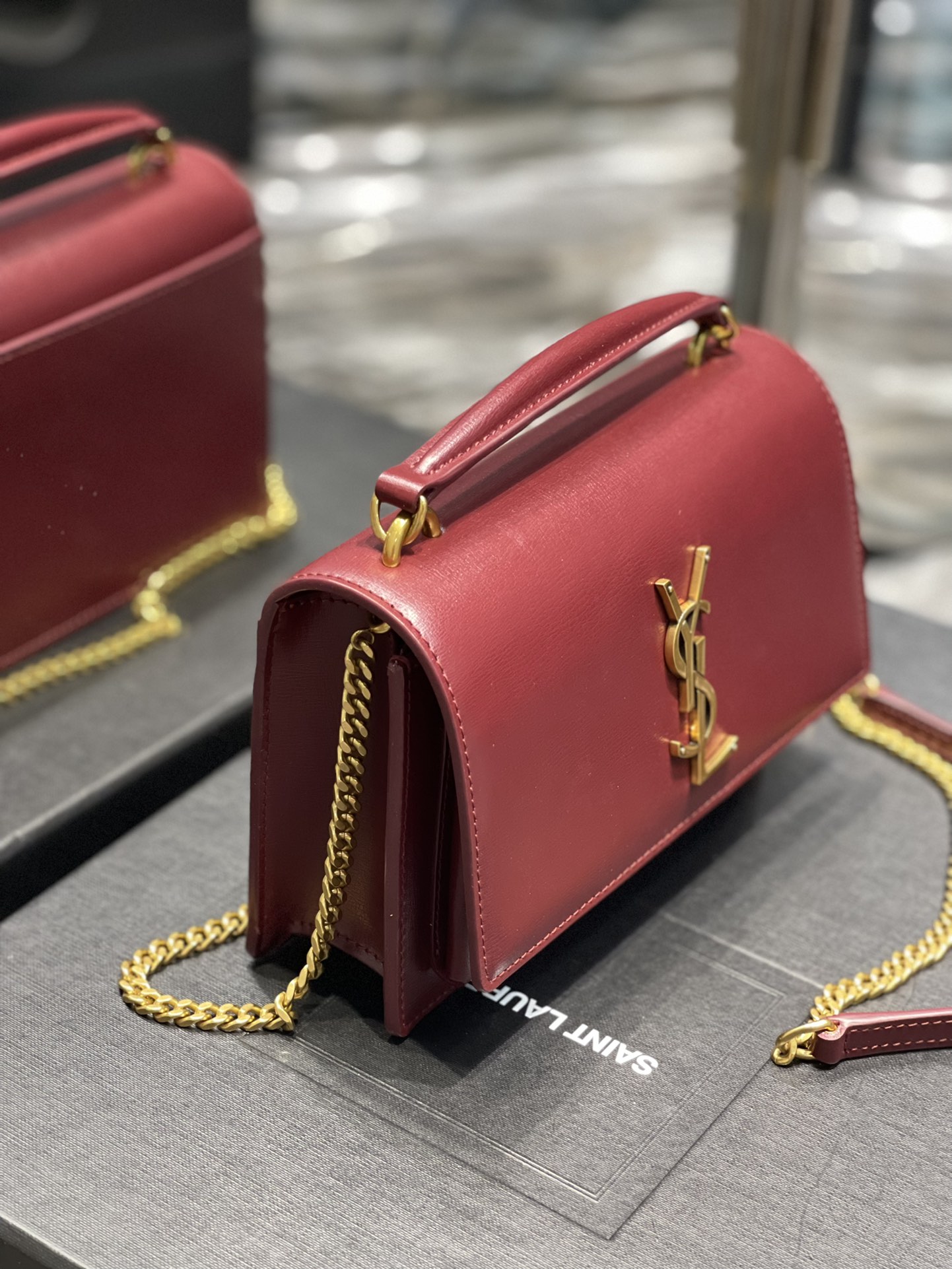 Replica Saint Laurent 19cm Sunset Woc Chain Wallet in Smooth Leather Red with Gold Logo