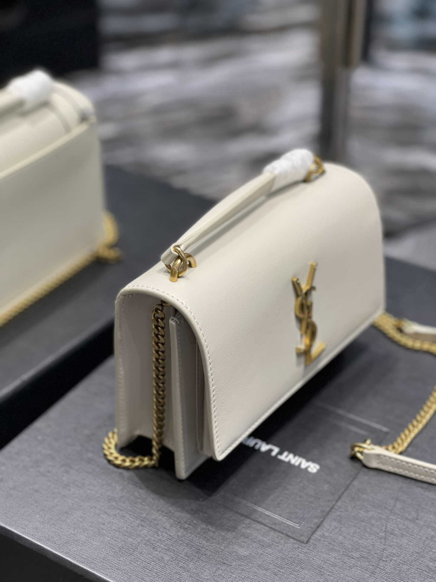Replica Saint Laurent 19cm Sunset Woc Chain Wallet in Smooth Leather White with Gold Logo